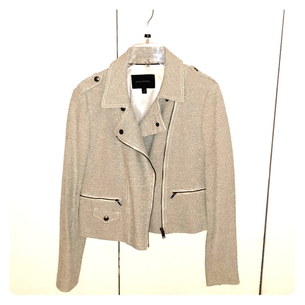 Black and white tweed blazer.